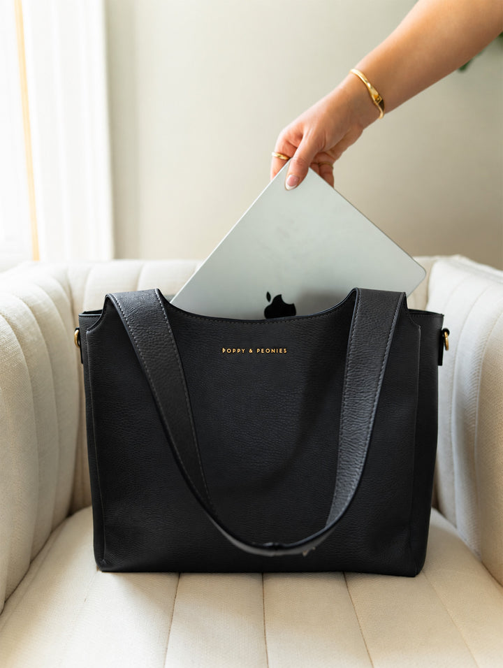 Poppy & Peonies The Companion Tote in Black with laptop, showcasing the padded laptop compartment for organized everyday carry.