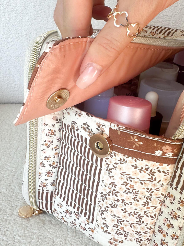 Poppy & Peonies The Routine Cosmetic Case in Brown Patchwork exterior pocket with magnetic closure.