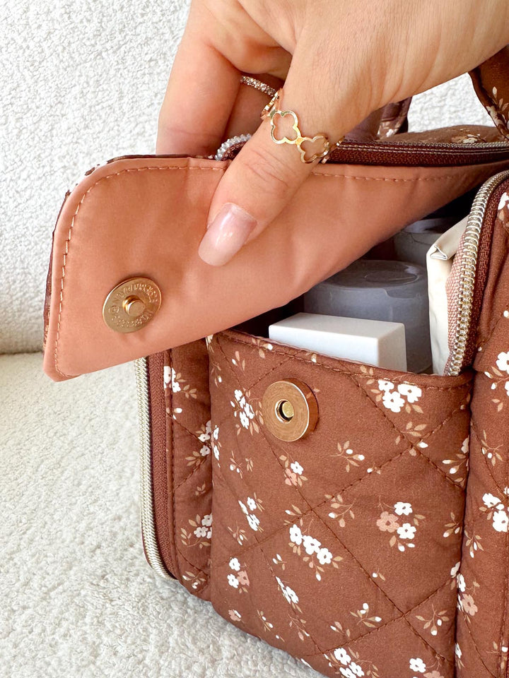 Poppy & Peonies The Routine Cosmetic Case in Brown Floral exterior pocket with magnetic closure.
