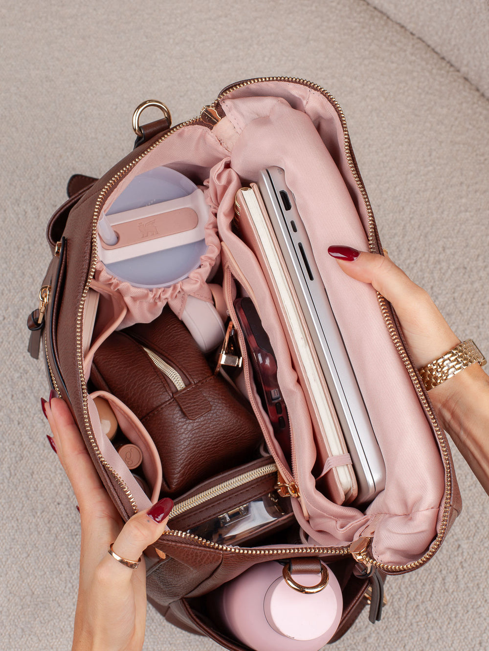 Poppy & Peonies Commuter Backpack in Espresso open top view showing the spacious blush pink interior with organized compartments for everyday essentials.