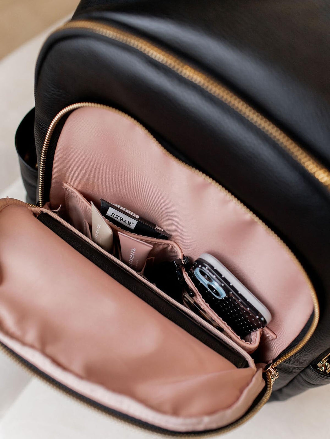 black faux leather backpack rose gold Detour Backpack Black