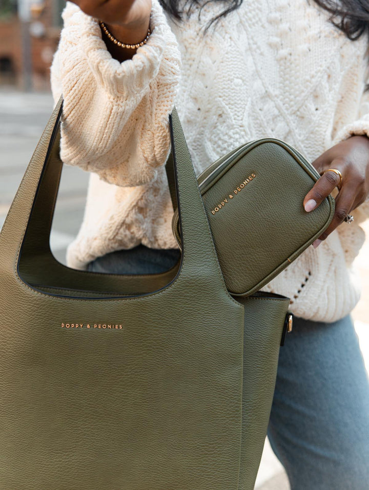 Poppy & Peonies The Companion Tote Bundle in Olive lifestyle close-up, showcasing the coordinating Pretty Connected Case with the tote.
