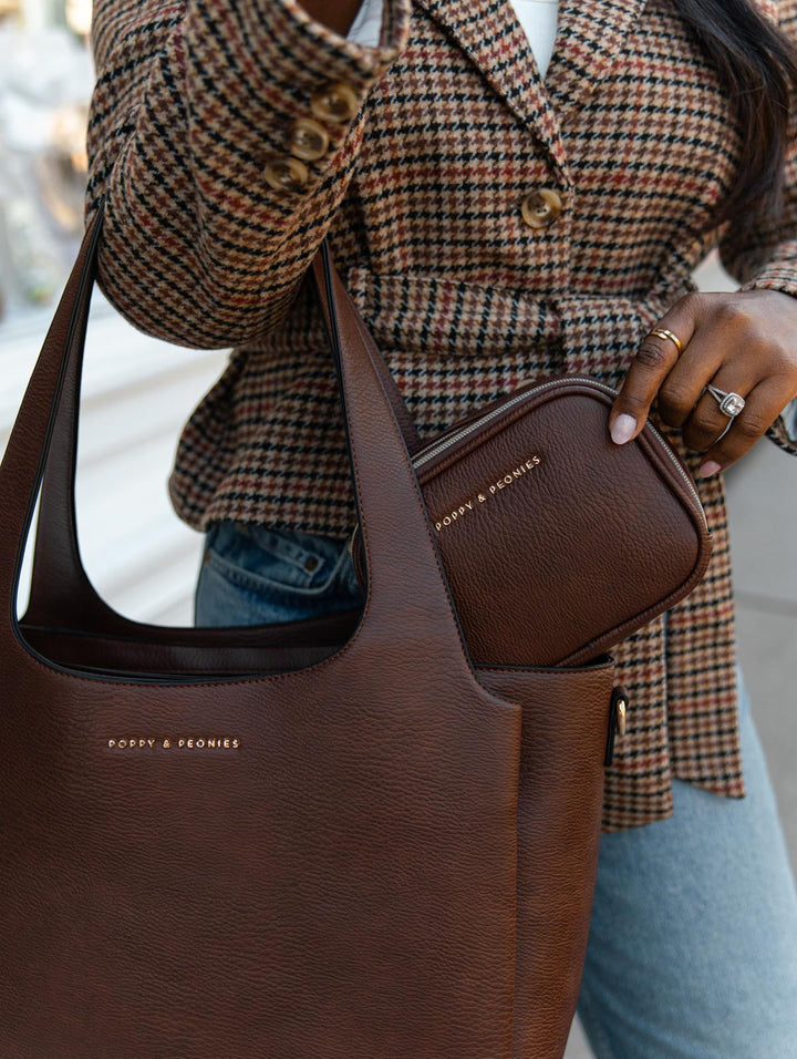 Poppy & Peonies Companion Duo in Espresso styled together, featuring The Companion Tote and coordinating Pretty Connected Case.