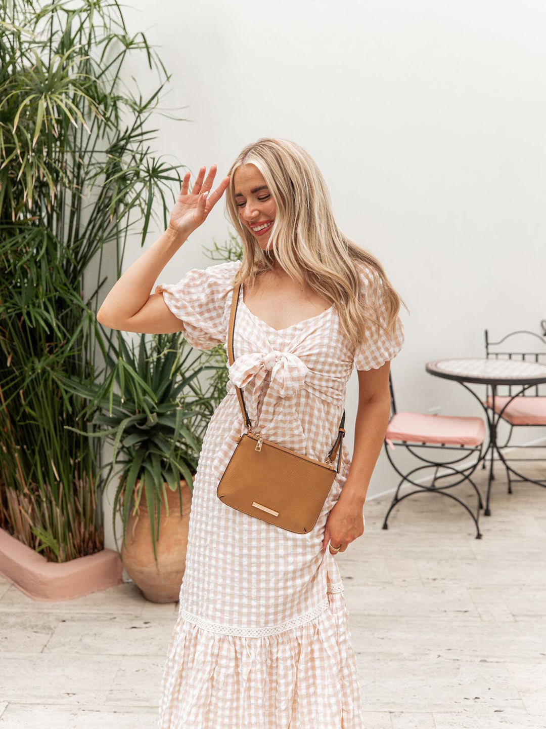 the EVERYDAY CROSSBODY camel