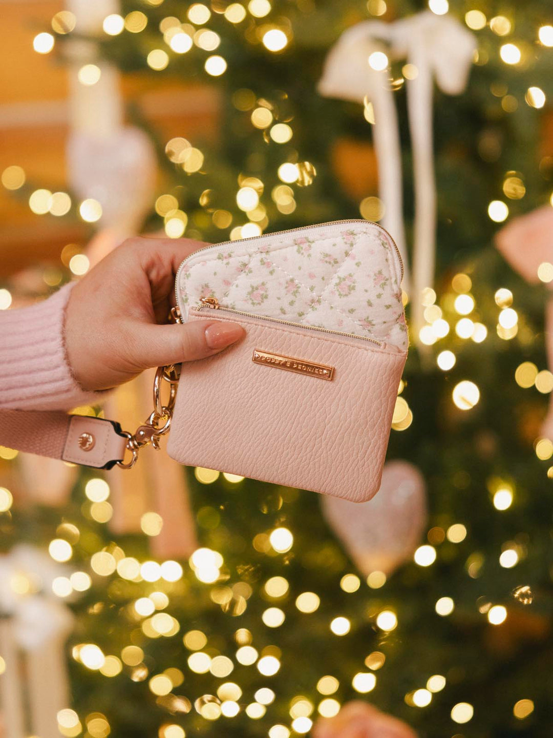 a pink and floral car holder