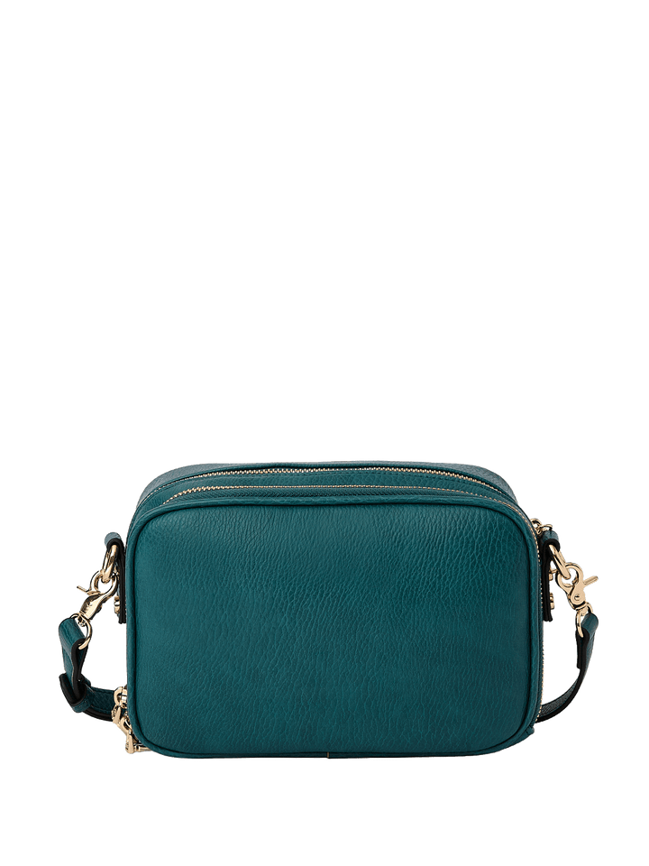 Teal handbag with gold accents on a transparent background