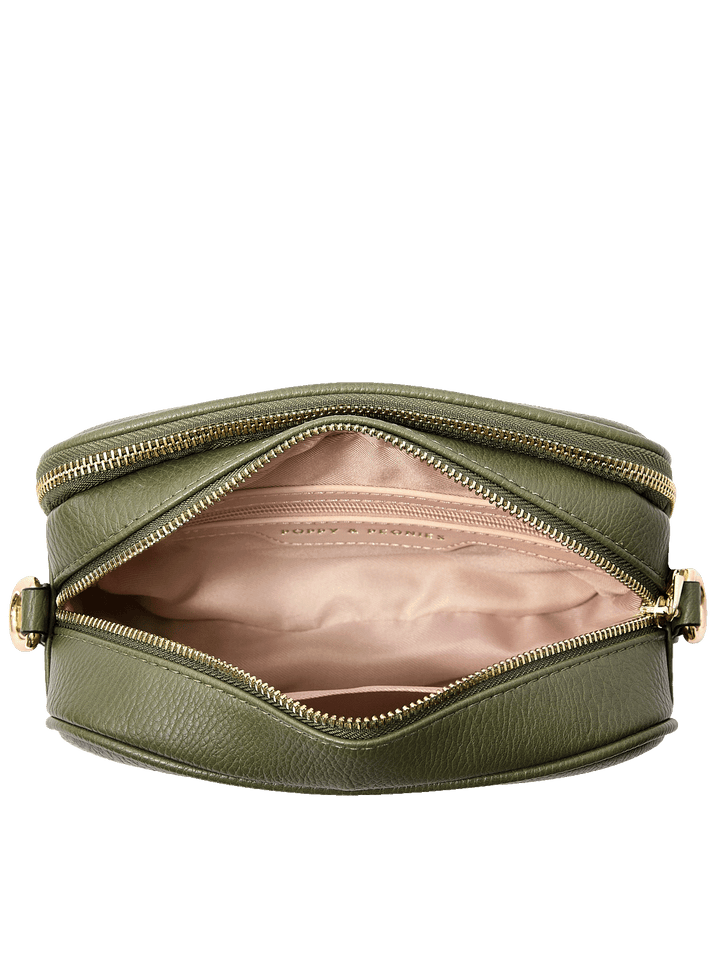 24/7 Crossbody in Olive showing built-in wallet with card slots and organized interior