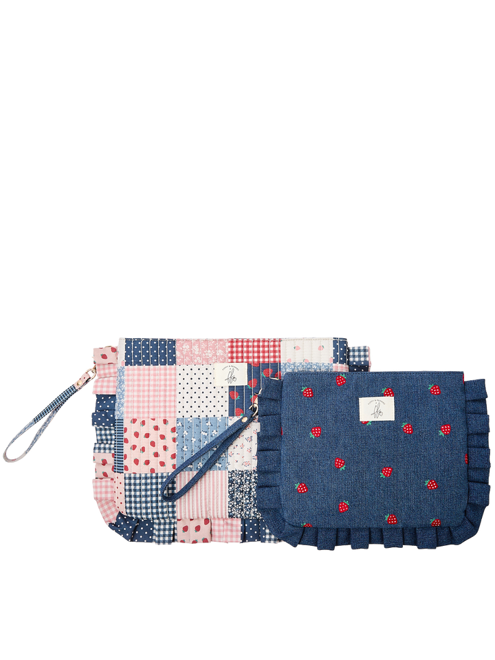 Poppy & Peonies 2-Piece Darling Ruffle Set in Strawberry Patchwork, featuring two coordinating zippered pouches in Strawberry Patchwork and Strawberry Denim prints with ruffled trim and wrist straps.