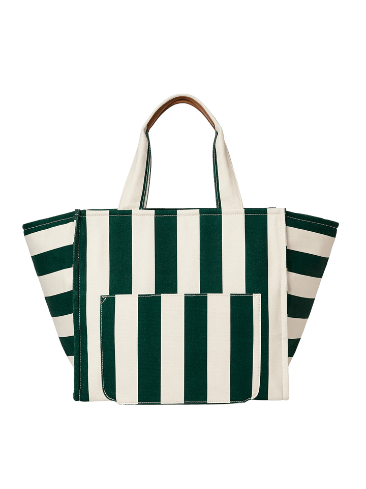 Green and white striped tote bag with a brown handle 