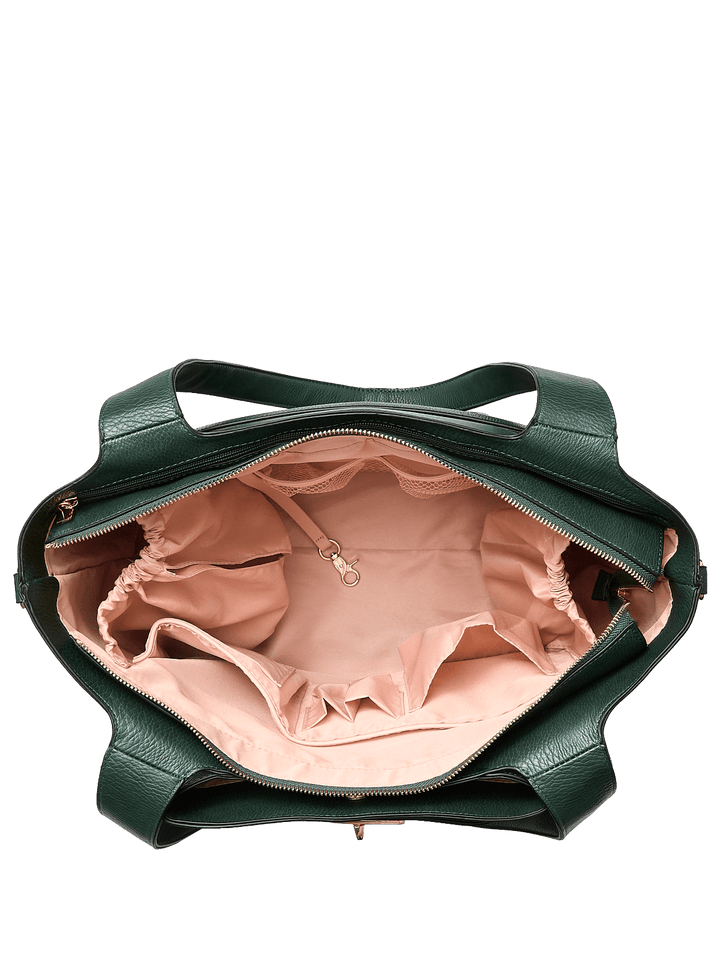 Green handbag with pink interior on a transparent background