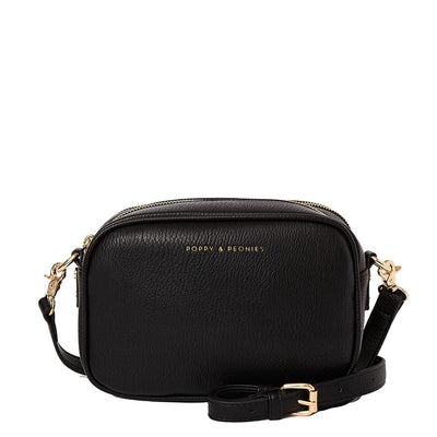 Front of a black Poppy and Peonies crossbody bag
