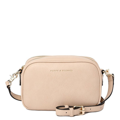 Front of a sand coloured Poppy and Peonies crossbody bag