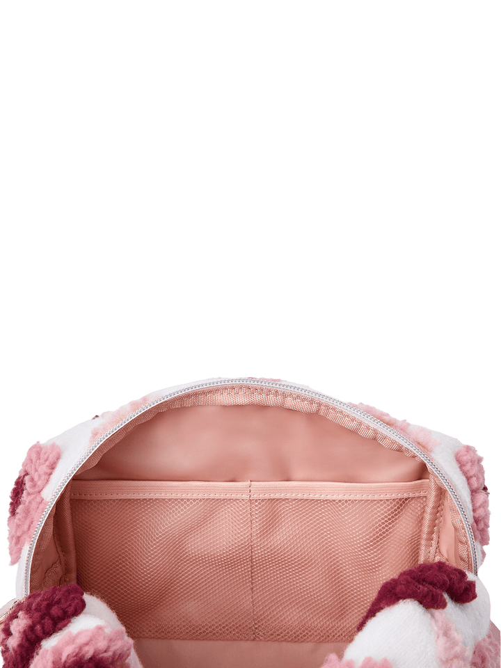 Poppy and Peonies Cosmetic Trio Floral featuring the large floral cosmetic pouch held open, revealing its blush pink interior lining, spacious main compartment, and elastic storage pocket.