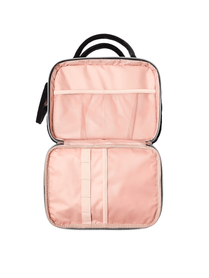 Poppy and Peonies The Routine Cosmetic Black Velvet displayed fully open from above, highlighting its blush pink lining, interior zippered pocket, elastic storage sections, and organized compartments for beauty essentials.