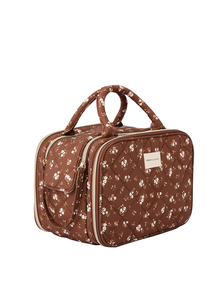 Poppy & Peonies The Routine Cosmetic Case in Brown Floral angled side view.
