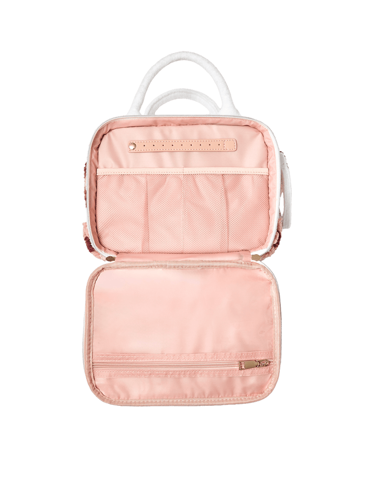 Poppy and Peonies The Routine Cosmetic Floral displayed fully open from above, highlighting its blush pink lining, interior zippered pocket, elastic storage sections, and organized compartments for beauty essentials.