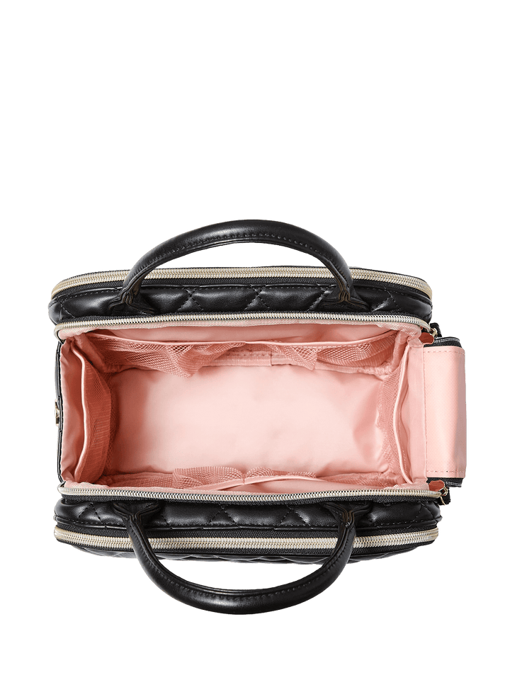 Poppy and Peonies The Routine Cosmetic Black displayed open from above, revealing its blush pink interior lining, spacious main compartment, and wide elastic storage band for organizing beauty essentials.