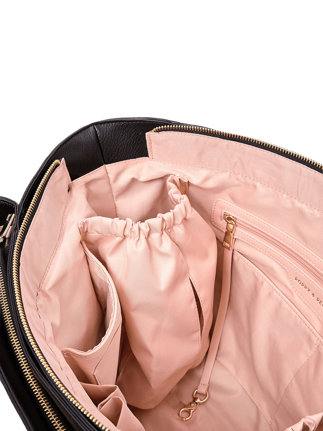 Close-up of Double Duty Tote in Black showing interior organization pockets and key leash