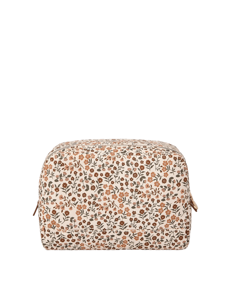 Poppy & Peonies Double Take Cosmetic Case in October Floral showing the cream canvas exterior covered in a delicate orange, brown, and green floral print.