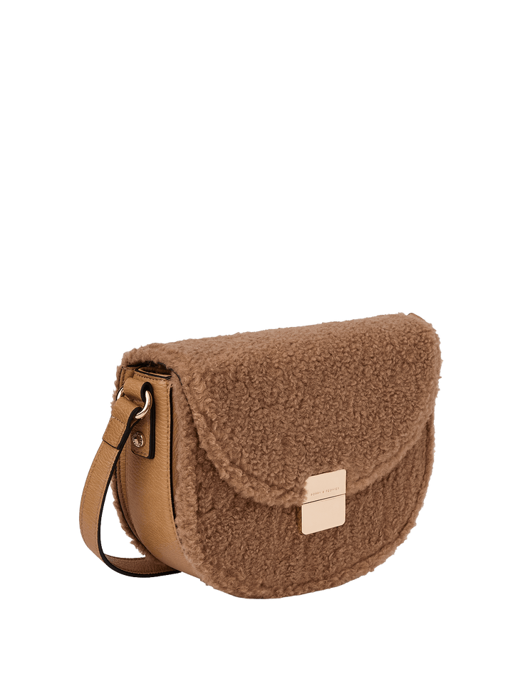 Brown faux fur crossbody bag with a vegan leather strap
