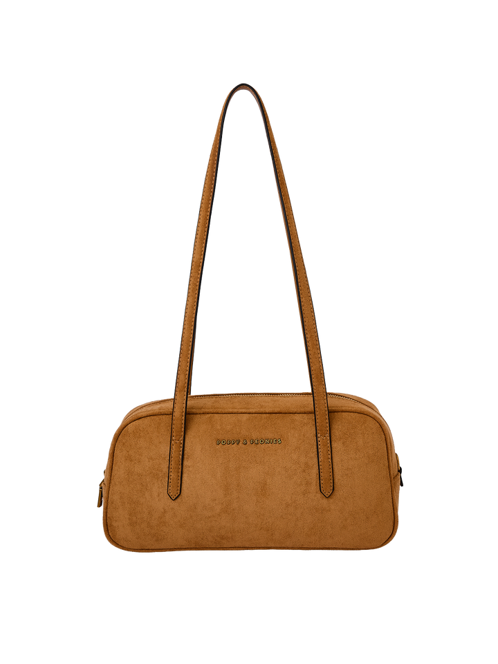 Poppy & Peonies The Friday Satchel in Cognac Suede front view, featuring long shoulder straps, a structured silhouette and signature gold-tone logo.