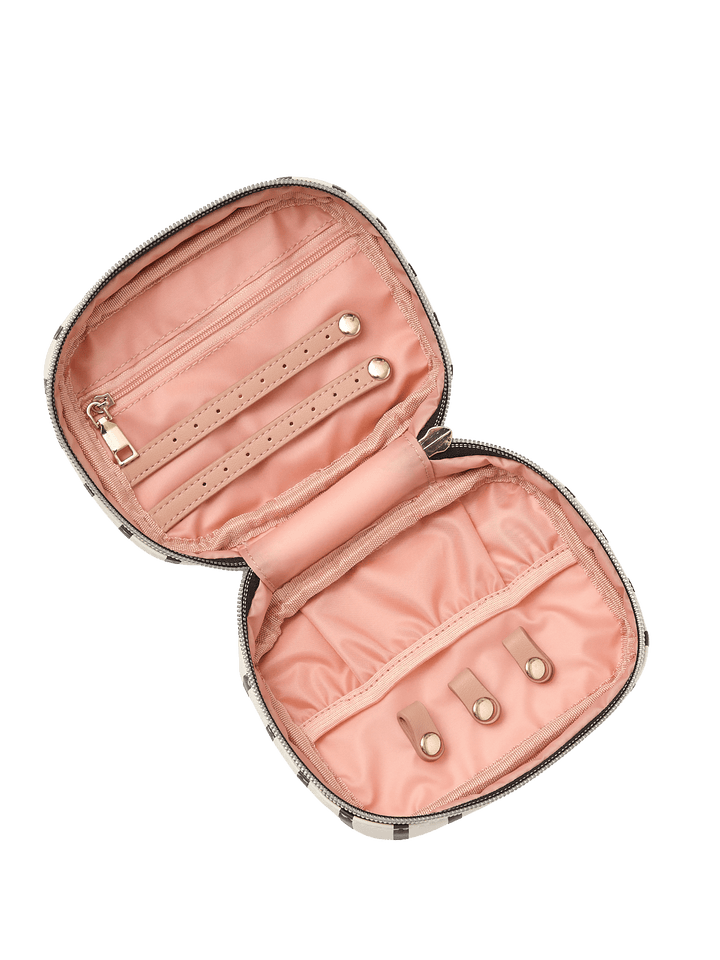 Open pink jewelry case with jewelry tabs