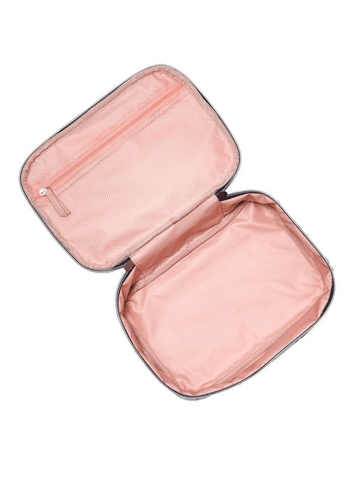 Pink travel case with open lid on a white background