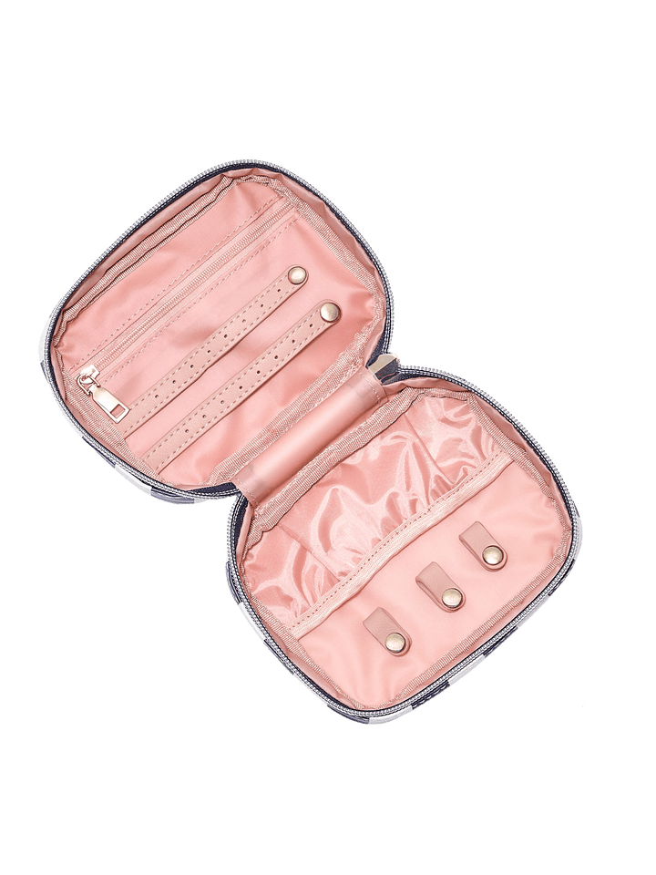Open pink jewelry case with gold accents