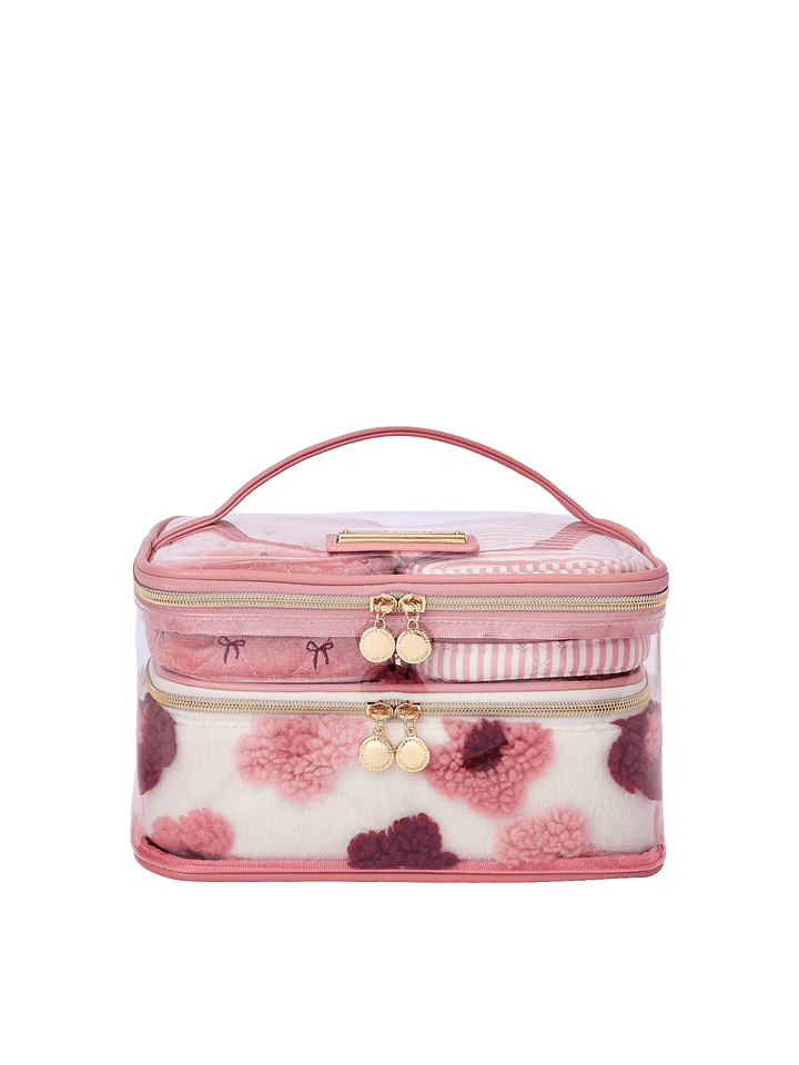 Poppy and Peonies Getaway Cosmetic Set Floral featuring a structured rectangular cosmetic case with a clear front panel, pink and berry floral patterns, blush pink trim, top carrying handle, gold-tone zipper closures, and decorative round zipper pulls.