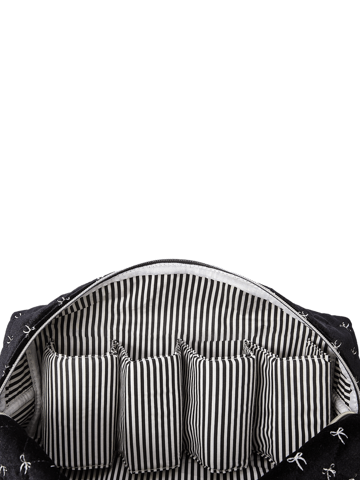 Poppy and Peonies The Mane Character Case Black Velvet displayed open from above, revealing its black and white striped interior lining, multiple elastic storage loops, and organized compartments for holding hair styling tools and accessories.