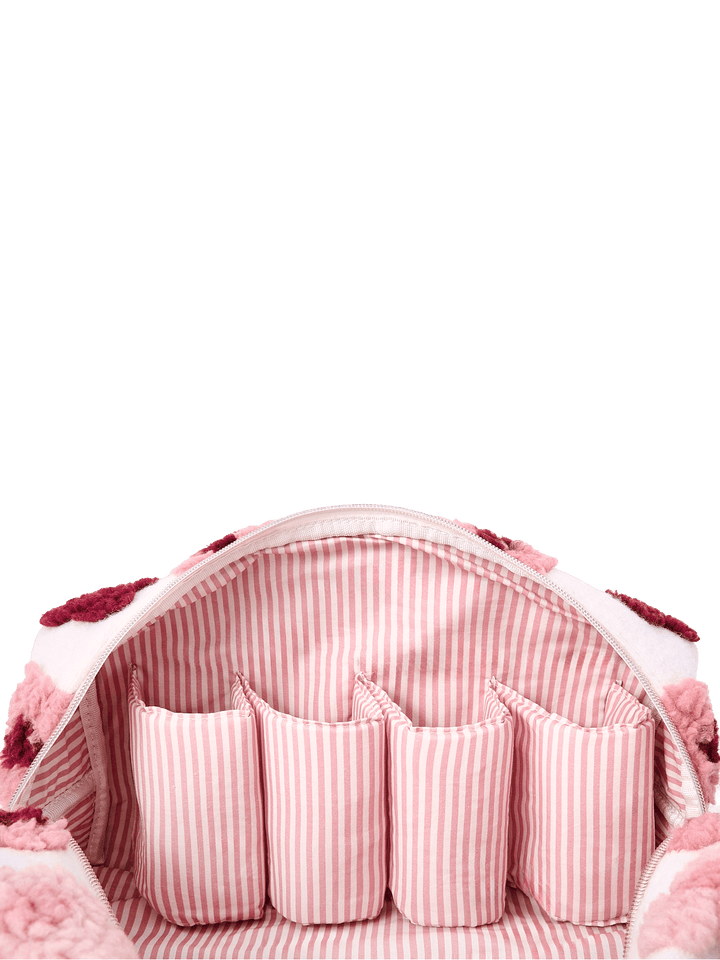 Poppy and Peonies The Mane Character Case Floral displayed open from above, revealing its pink and white striped interior lining, multiple elastic storage loops, and organized compartments for holding hair styling tools and accessories.