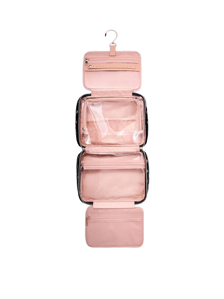 Poppy and Peonies Hook Me Up Cosmetic Case Black Velvet displayed fully unfolded from above, revealing its blush pink interior with multiple zippered compartments, transparent storage pockets, and a hanging hook for organizing beauty essentials.