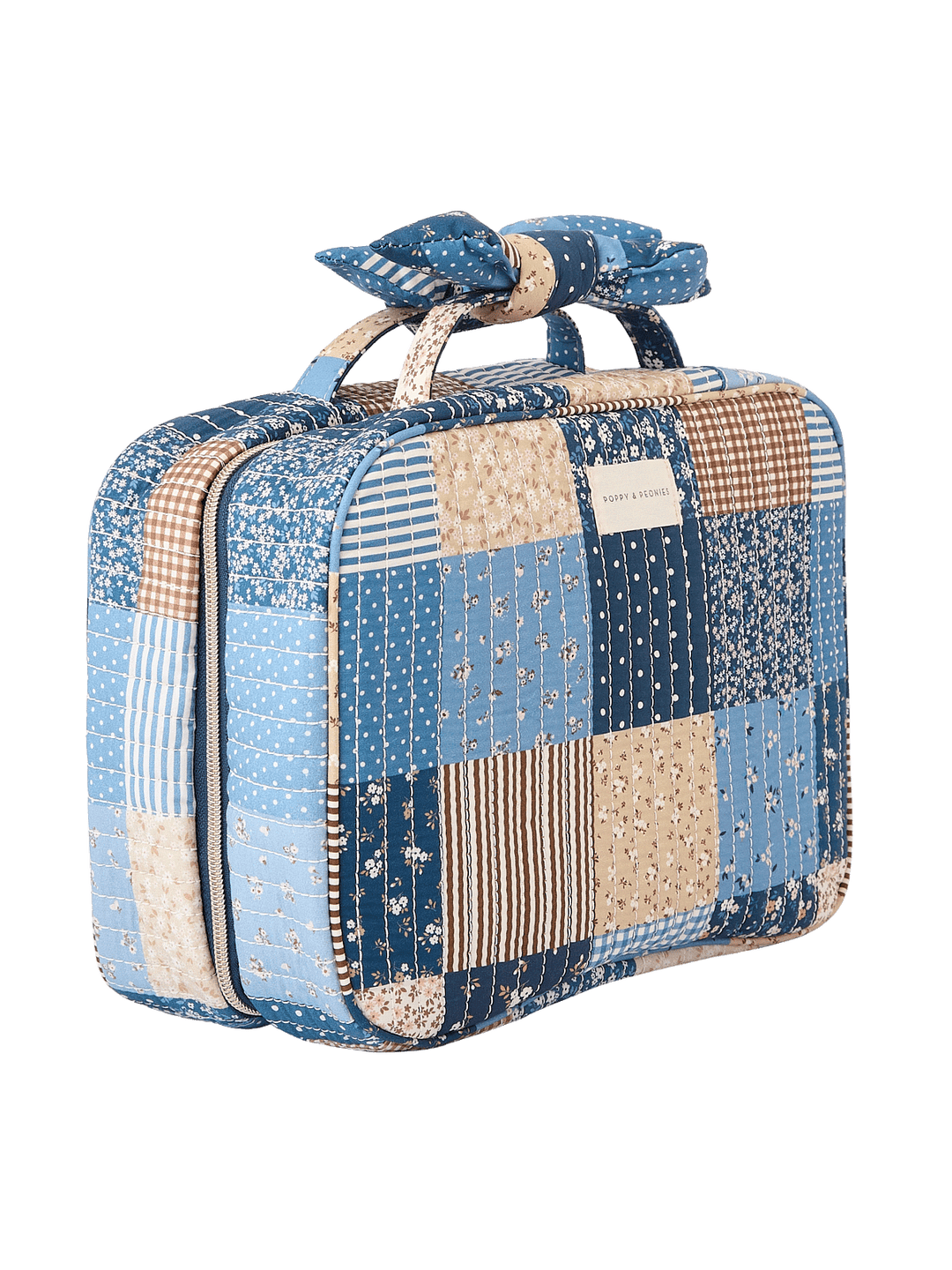 Angled side view of Large Hook Me Up Cosmetic Case in Navy Patchwork