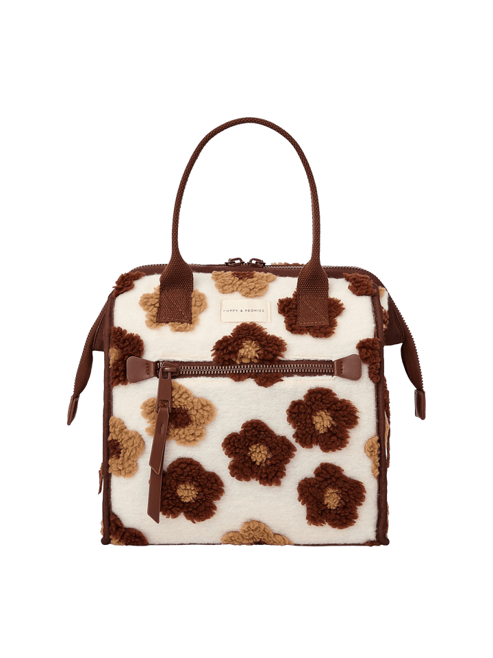Poppy and Peonies The Lunch Bag Espresso Floral displayed from the front, showcasing its cream-colored exterior with brown and espresso floral patterns, dual brown top handles, structured rectangular silhouette, and front zippered pocket.