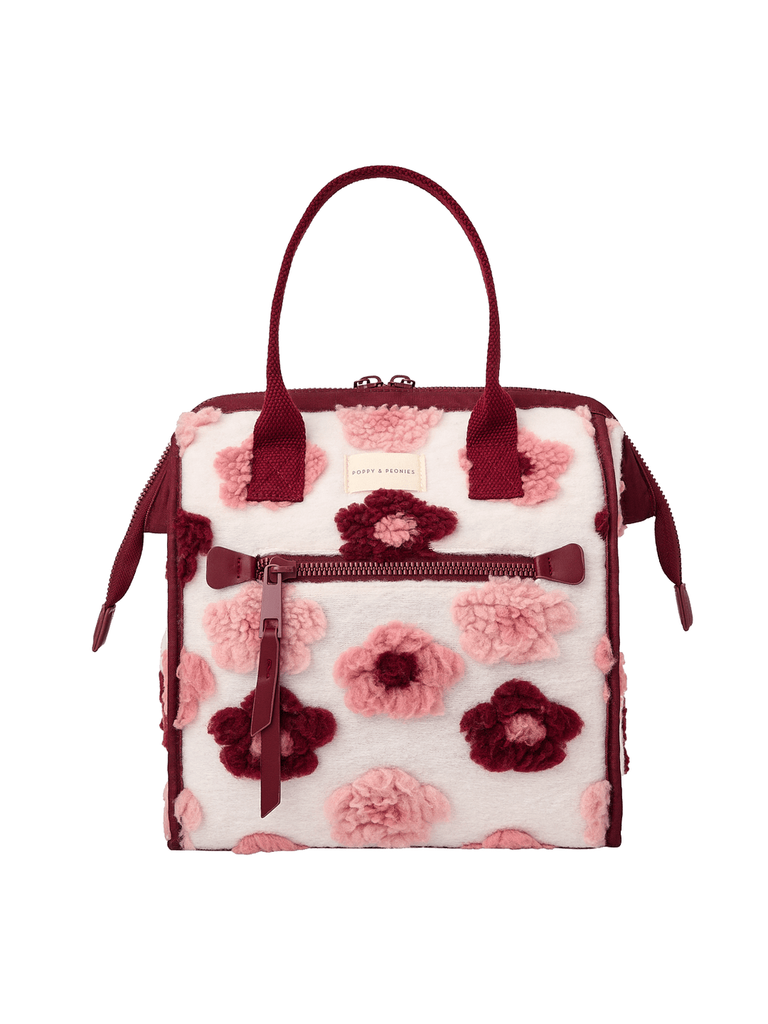 Poppy and Peonies The Lunch Bag Berry Floral displayed from the front, showcasing its cream-colored exterior with pink and berry floral patterns, dual berry top handles, structured rectangular silhouette, and front zippered pocket.