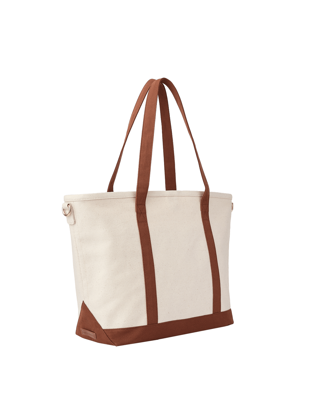Angled product view of Poppy & Peonies The Signature Tote in Chestnut, highlighting its structured cream canvas body, long chestnut brown handles and reinforced base.