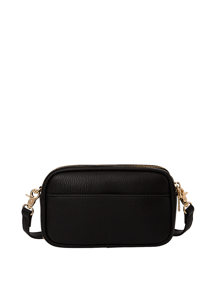 Black leather crossbody bag with gold accents on a transparent background