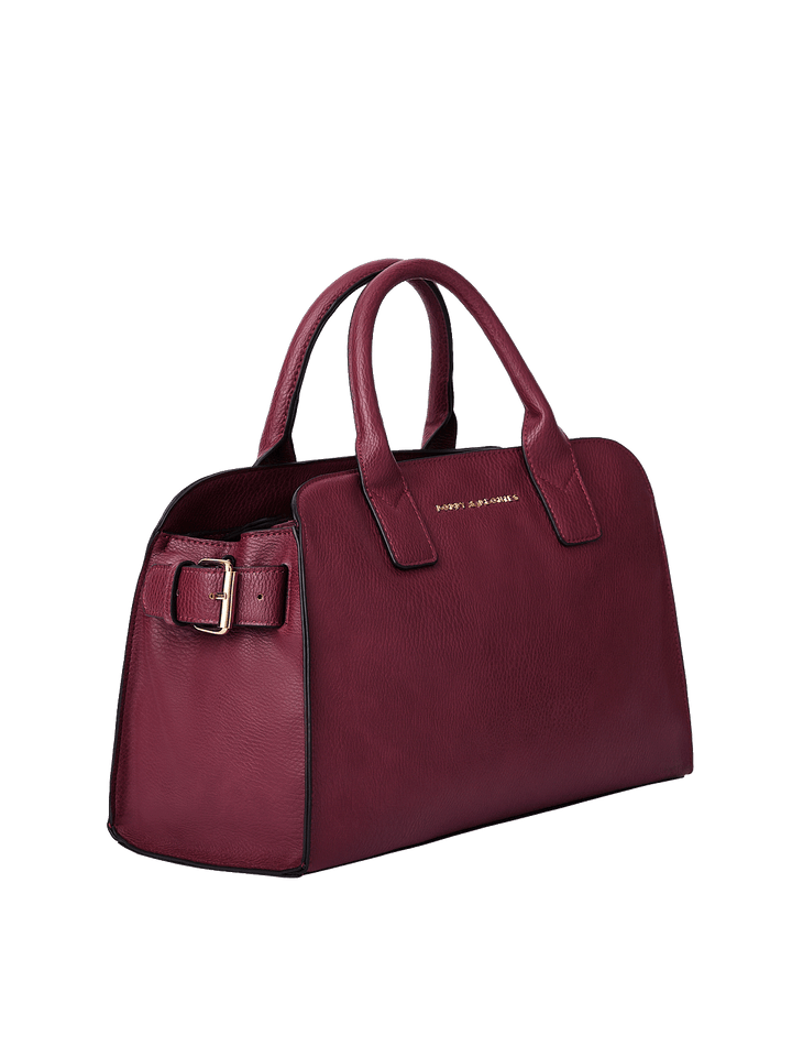 Side profile of the Mini Uptown Tote in Berry showing structured silhouette and spacious design