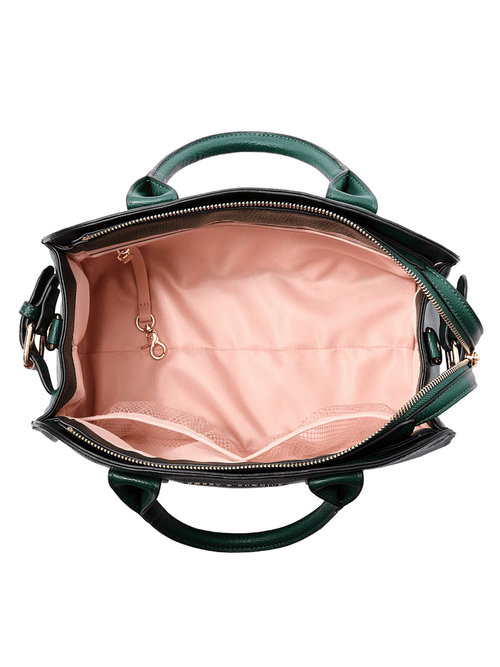 Interior of the Mini Uptown Tote in Heritage Green showing mesh pockets, zip pocket, key leash, and organized compartments