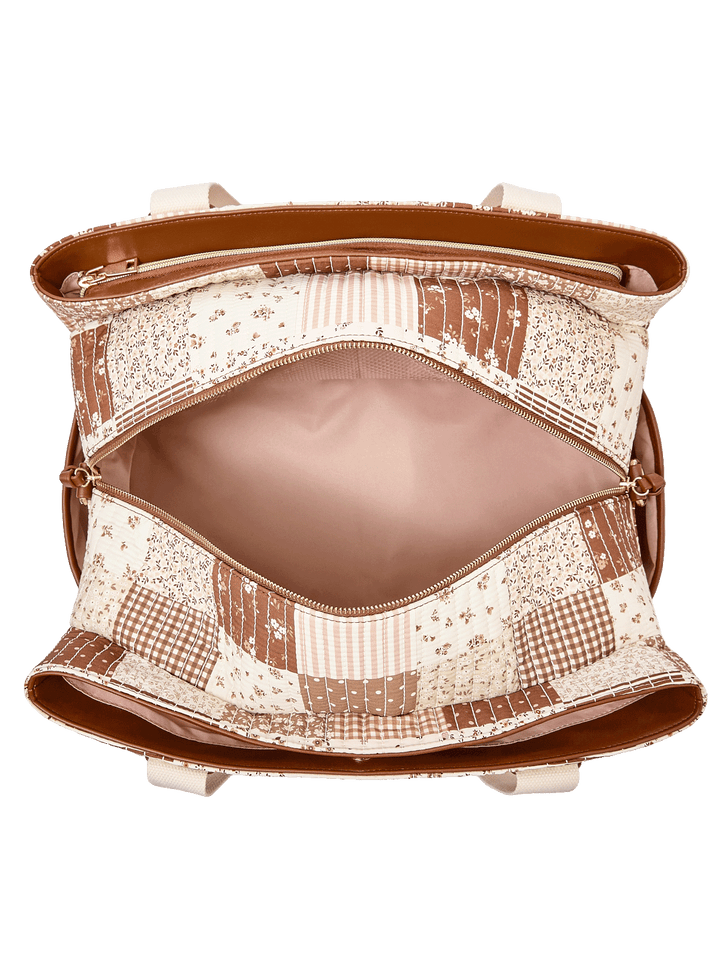 Interior of Mini Voyager tote in Brown Patchwork showing triple-opening compartments and organizer pockets