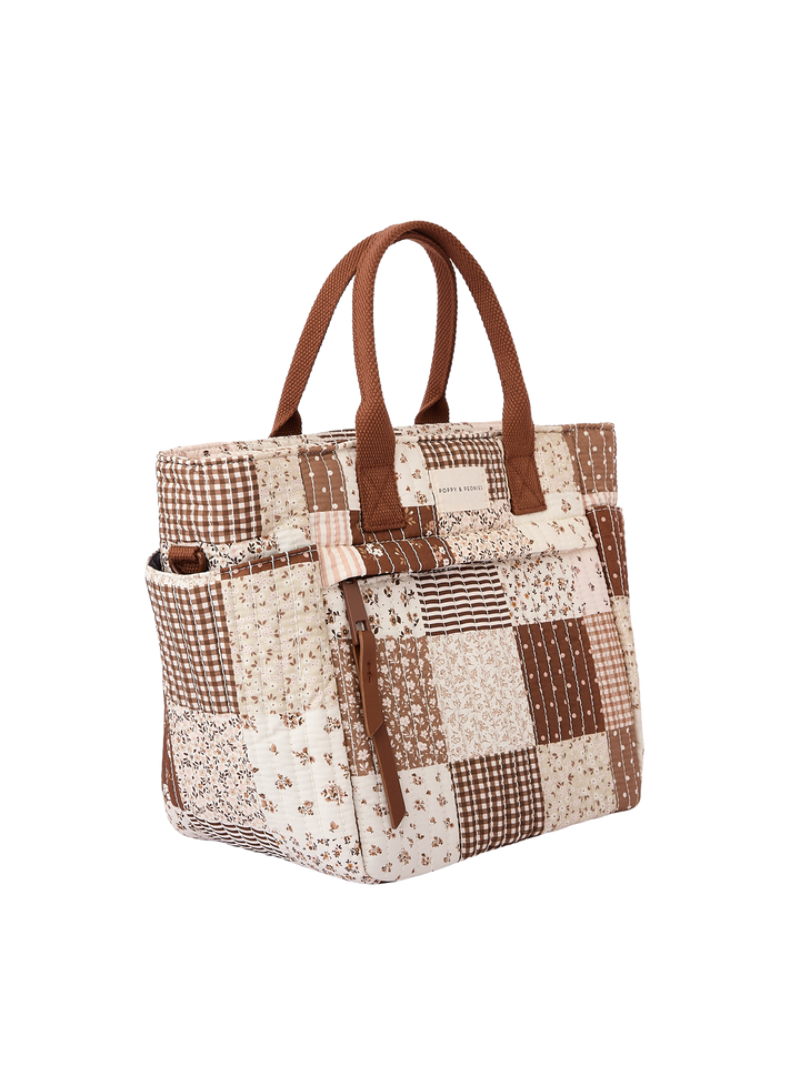Poppy & Peonies The Lunch Club Lunch Bag in Brown Patchwork angled side view.