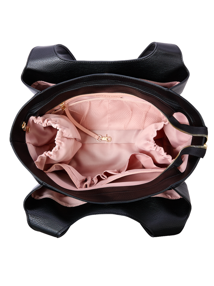 Poppy & Peonies The Companion Tote in Black open top view, showcasing the spacious blush-pink interior with cupholder and multiple organizational pockets.