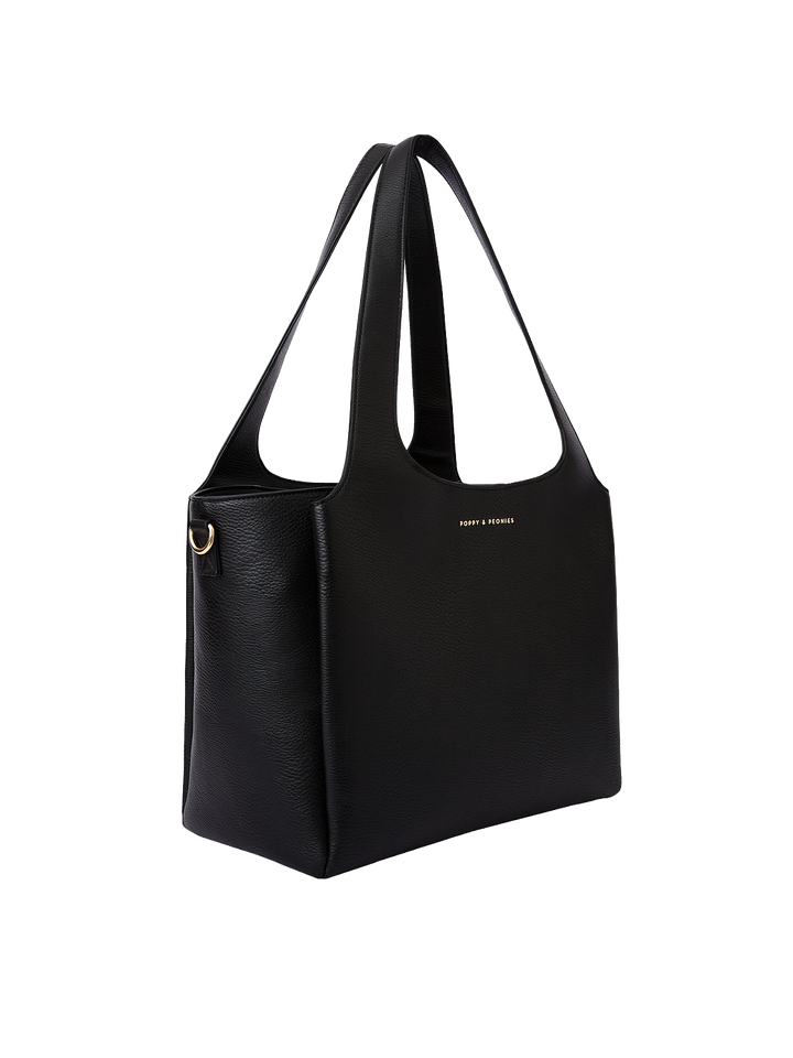 Poppy & Peonies The Companion Tote in Black angled side view, highlighting its spacious depth, structured shape and top handles.