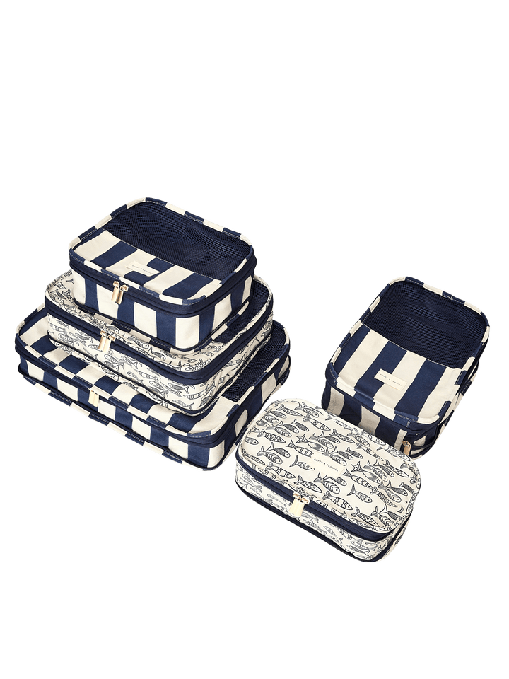 Set of five navy and white striped packing cubes