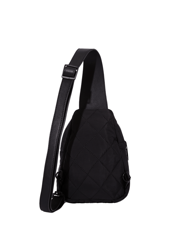 Black quilted sling bag on a transparent background