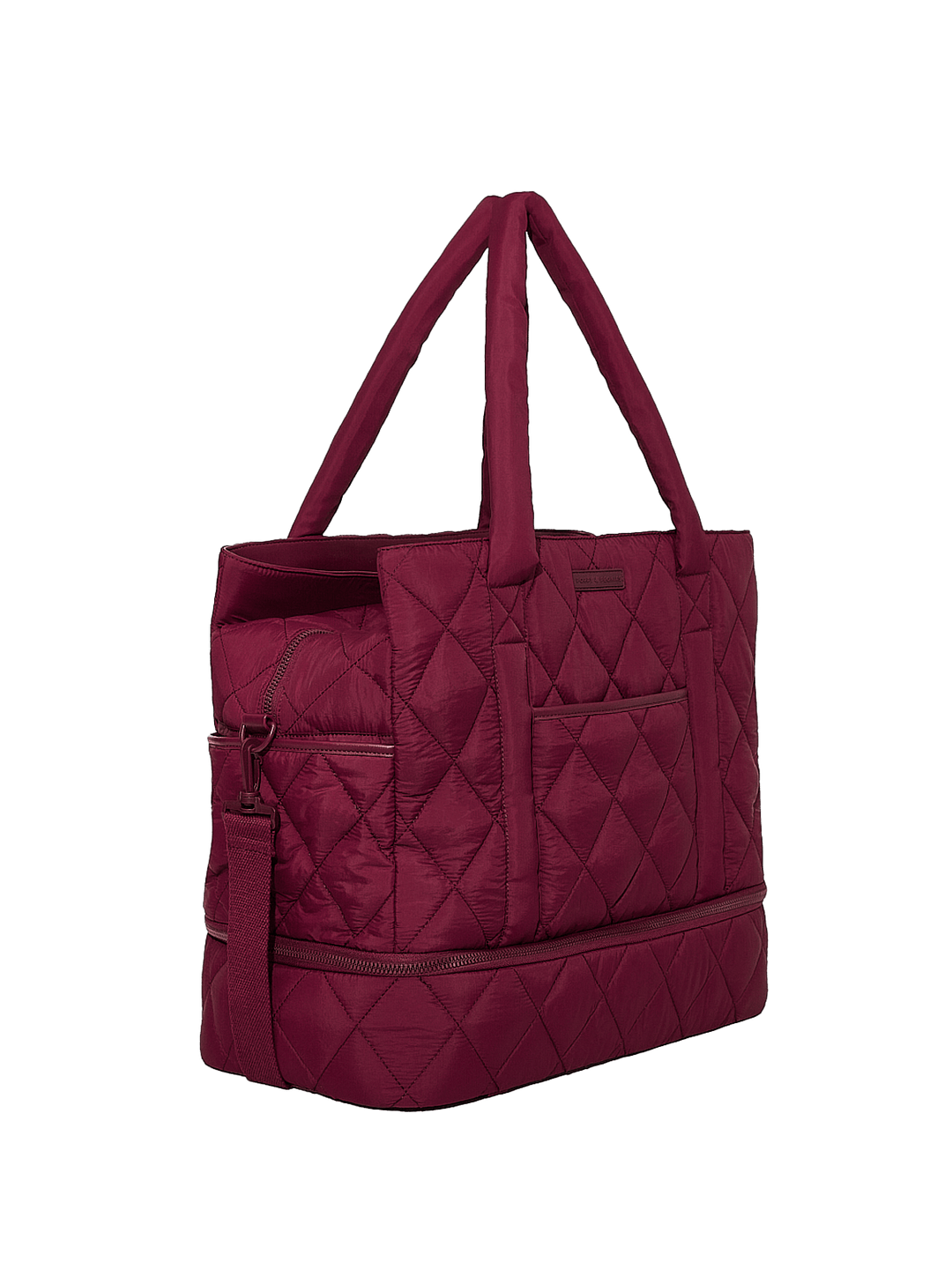 Quilted berry travel bag on a transparent background