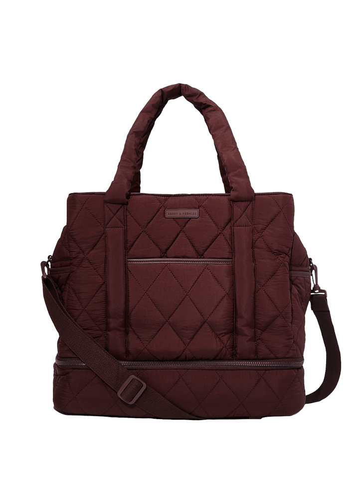 Quilted brown travel bag with a shoulder strap on a transparent background