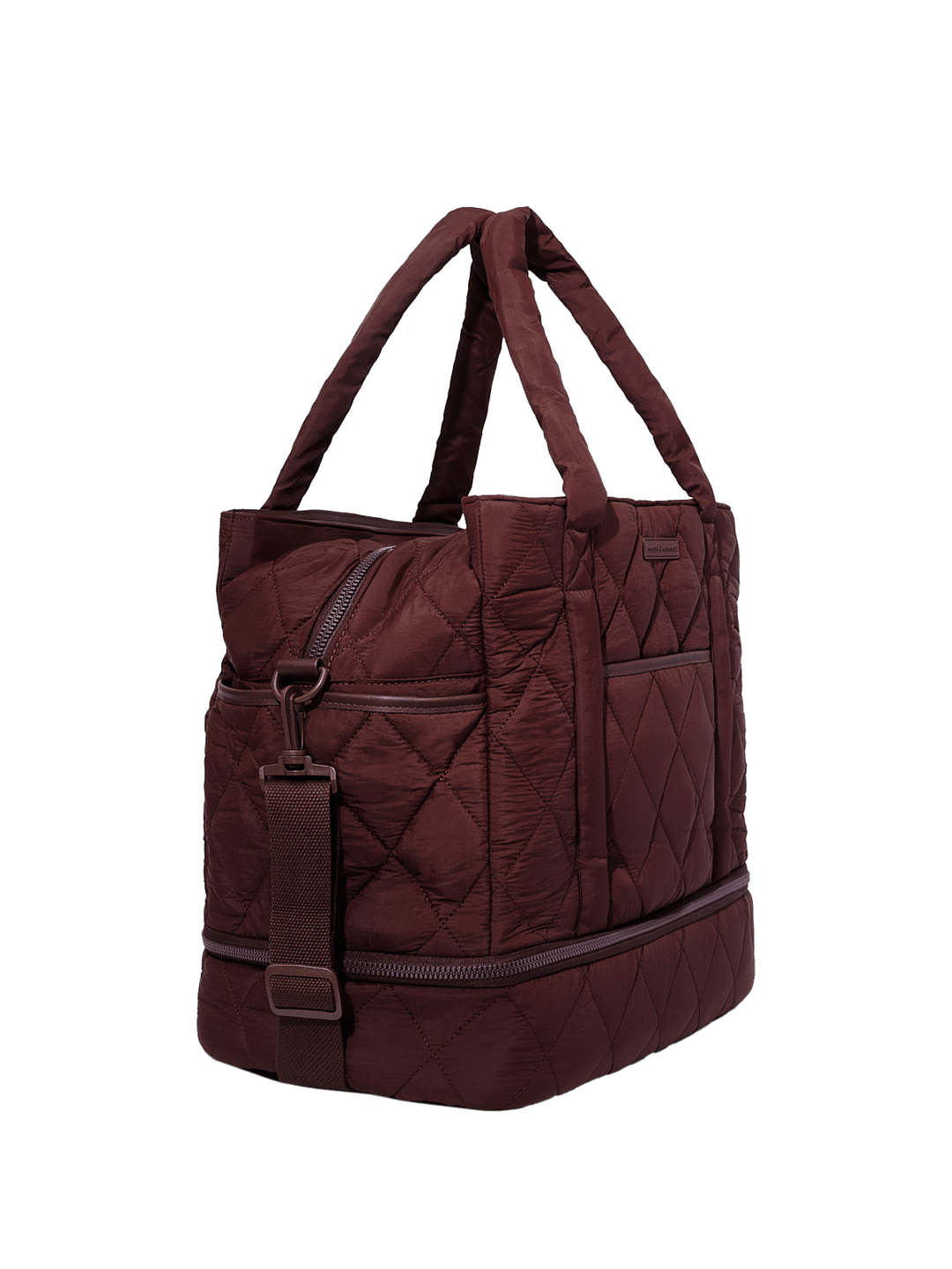 Quilted brown handbag on a transparent background