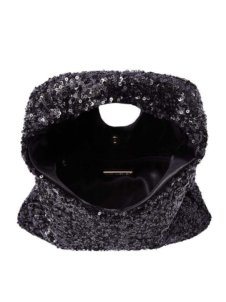 Poppy and Peonies The Jingle Belle Shoulder Bag Black displayed open from above, revealing its smooth black interior lining, spacious main compartment, and interior closure.