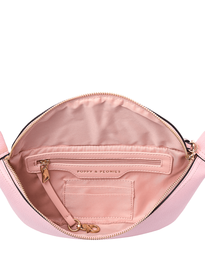 Interior of a pink vegan leather crossbody bag 